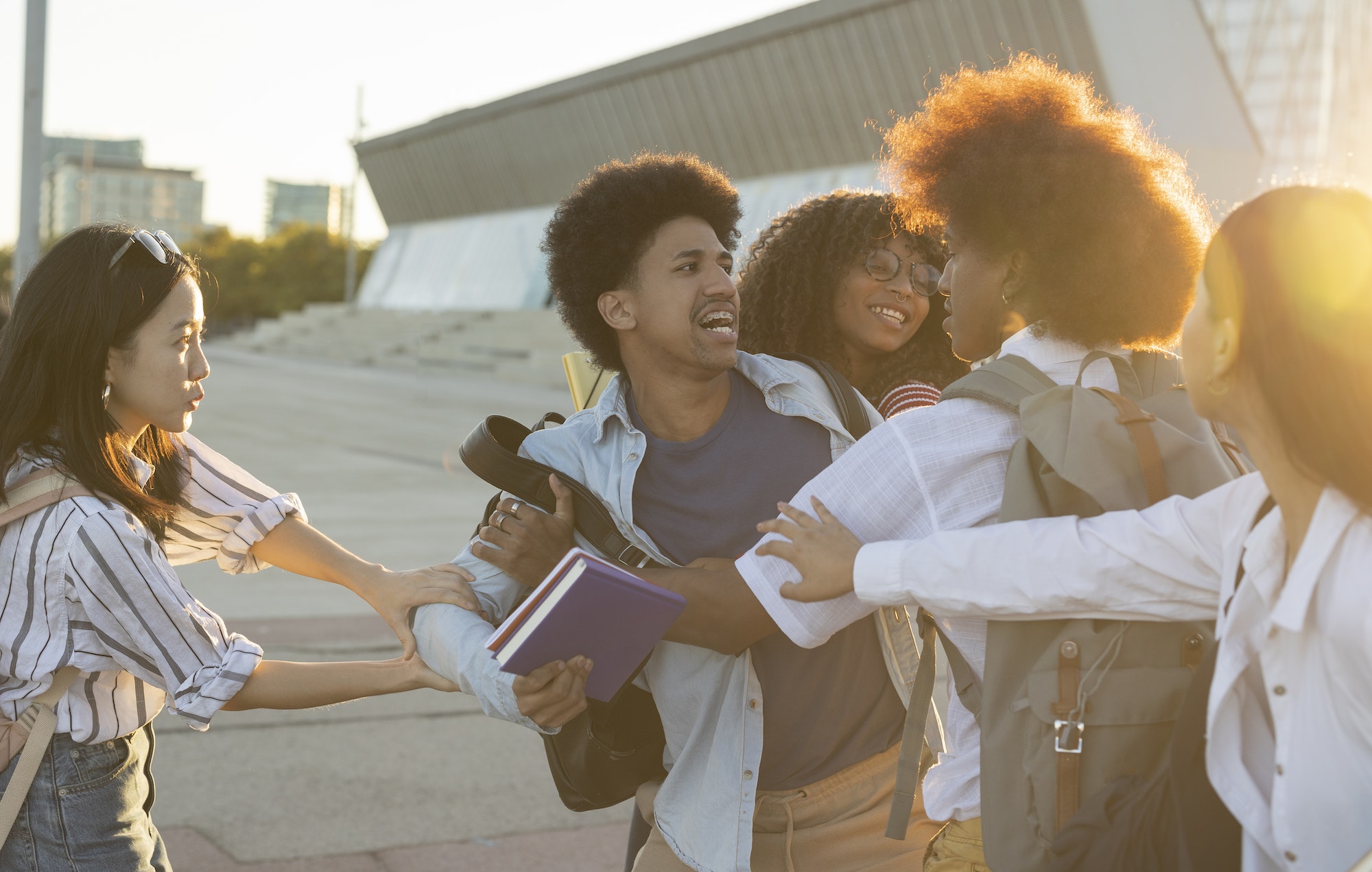 Students scrambling for a book