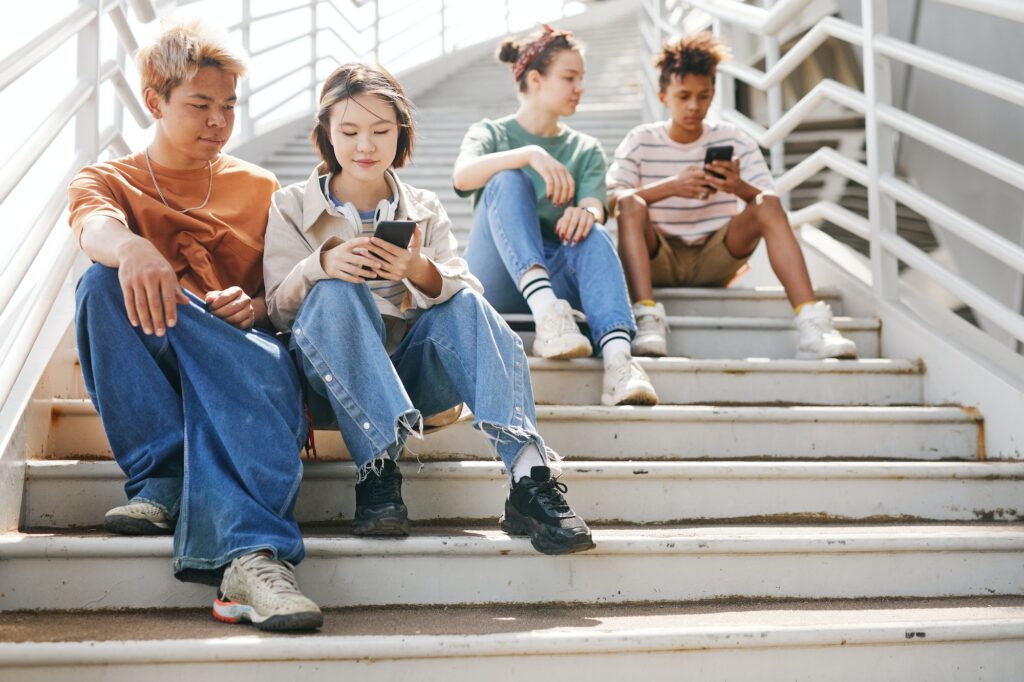 Teens on Stairs Outdoors